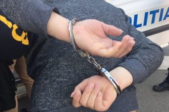 Sot agresiv retinut de politie la Sibiu