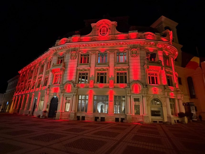 Cladirile emblematice din Sibiu luminata in rosu cu ocazia Zilei Mondiale a Tuberculozei